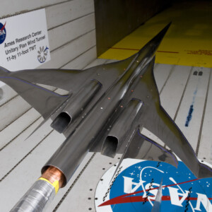NASA aircraft model in wind tunnel.