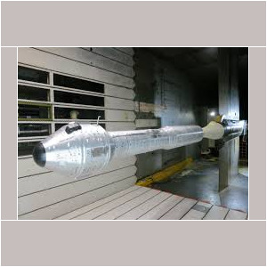 Long slender spacecraft model mounted in tunnel