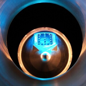 Blue light inside metallic circular device.